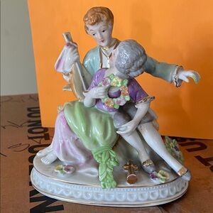 Porcelain Figurine with Floral Details